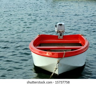 The Red Boat With Motor Overhead.