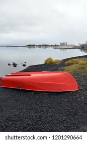 Red Boat On Coast In Iceland Þingvallavatn