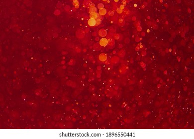 Red bokeh of lights on black background
