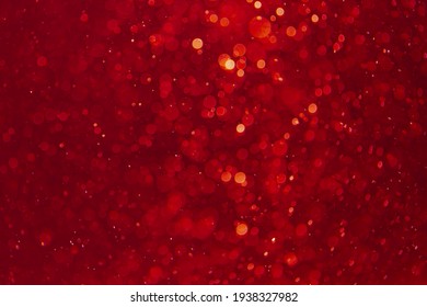 Red bokeh of lights on black background