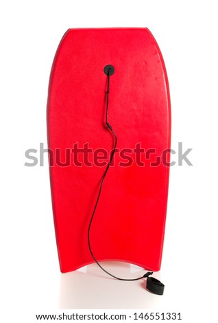 A red boogie board on a white background