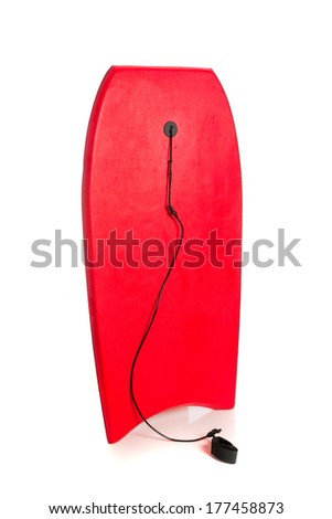 A red boogie board on a white background