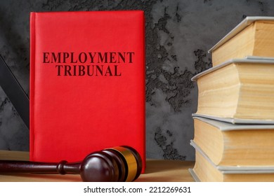 Red Book Employment Tribunal And A Gavel.