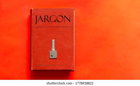 red book with text JARGON and a key on a red background
