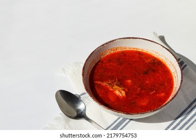 Red Borsch Red Soup With Meat In A Plate With Spoon. Space For Text