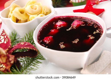 Red Borscht With Mushroom Ravioli As Traditional Christmas Eve Soup