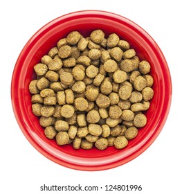 Red Bowl Of Dry Dog Food Isolated On White