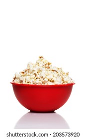 Red Bowl With Popcorn Isolated On White