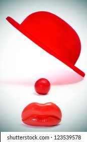 Red Bowler Hat, Clown Nose And Mouth On A White Background