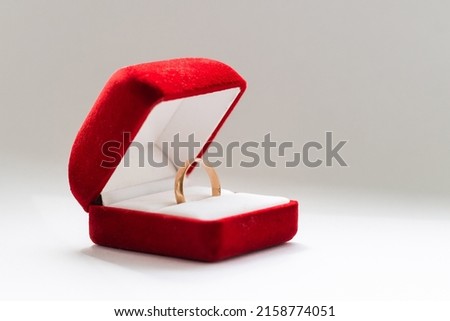 Red box for gold ring on a white background