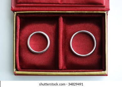 Red Box With Two Wedding Rings - View From Above