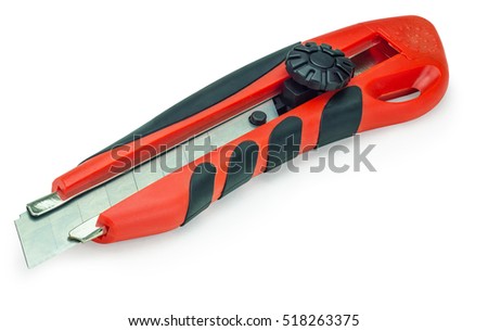 Red boxcutter on an isolated white background