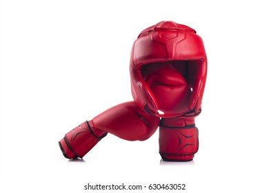 Red Boxing Head Guard With A Pair Of Red Boxing Gloves