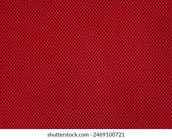 Red breathable porous poriferous material for air ventilation with holes. Sportswear material nylon texture. - Powered by Shutterstock