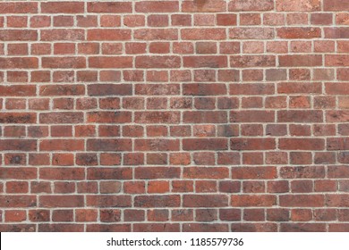 Red brick background image - Shutterstock ID 1185579736