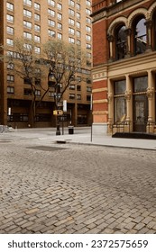 red brick budlings and trees with fall foliage on crossroad in new york city, autumnal scene
