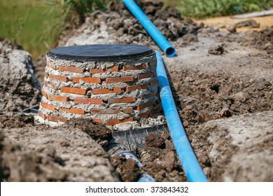 Red Brick Build Over Septic Tank For Protection.