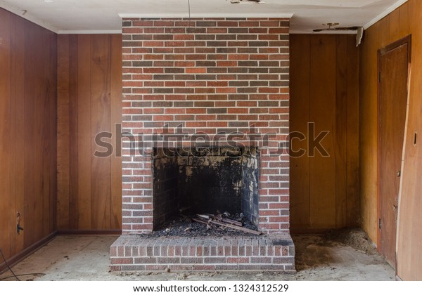 Red Brick Fireplace Set Against Wood Stock Photo Edit Now 1324312529