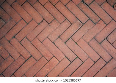 Red Brick Flooring Seamless Pattern. Top View of Red Bricks Paving Stones Footpath on a Sidewalk Outdoors as Brickwork Weaved Texture or Abstract Stone Paver Herringbone Template Background Copyspace