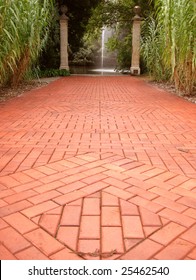 Red Brick Path To Fountain In Distance