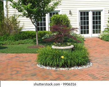 Red Brick Patio With Landscaping