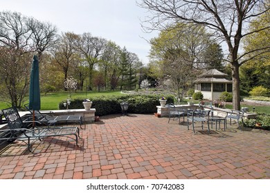 Red Brick Patio In Spring With Gazebo