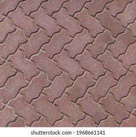 Red Brick Pavers Pattern Showing Interlocking Texture With Rough Surface And Grout Lines