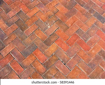 Red Brick Paving Stones On A Sidewalk