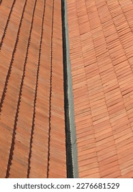 red brick roof tiles surface useful as a background - Shutterstock ID 2276681529