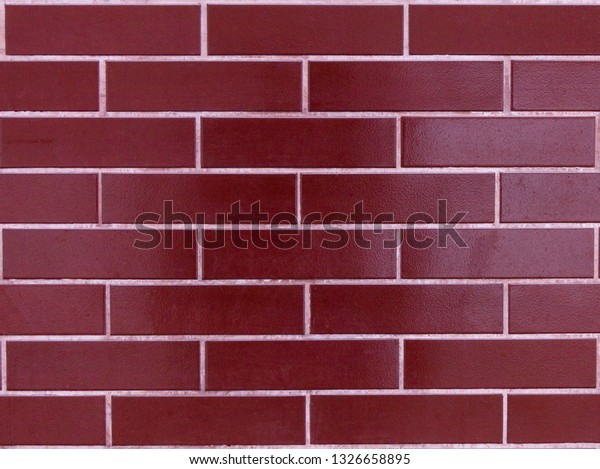 Red brick texture. The material is
red brick. Brilliant brick. Decorative
Kerpich.