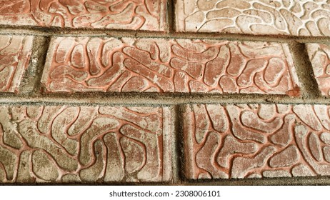Red brick with texture and pattern on wall or floor. Abstract background, texture, frame, and pattern