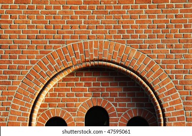 Red brick wall arch