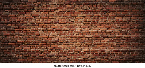 Red Brick wall background. Old Red stone blocks panoramic texture