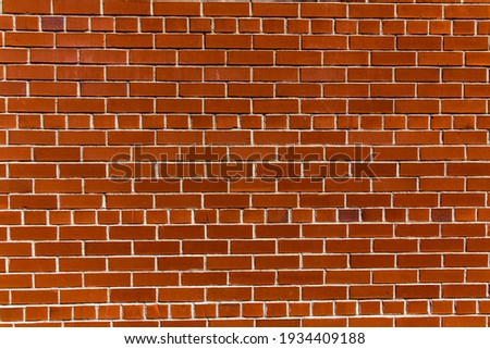 Red brick wall with contrasty sunlight