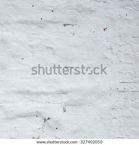 Red Brick Wall With Damaged White  Plaster Frame Background Texture Close Up