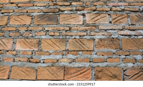 Red Brick Wall Image (background Material), Old Vintage, Architecture Wall Surface. Gruny Wide Brickwall. Building With Damaged Plaster. Unfinished Vintage Wall Background And Texture, Retro.