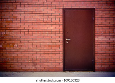 The Red Brick Wall And The Iron Closed Door