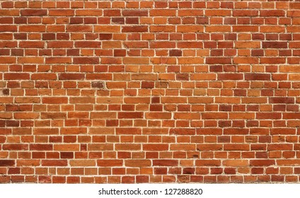 Red brick wall texture background - Shutterstock ID 127288820