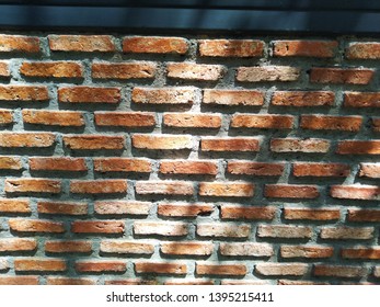 red brick wall texture background with vignette corners