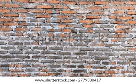 Red brick wall texture background with natural sunlight for construction and interior design.