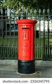 A red British post box in Greenwich, London, England 