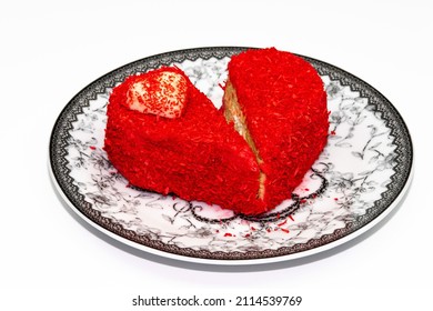 Red Broken Heart Shaped Cake On Black And White Plate On White Background