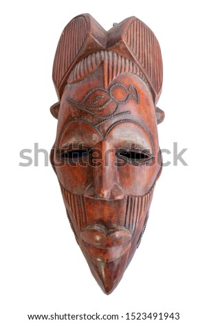 Red brown African mask against a white background