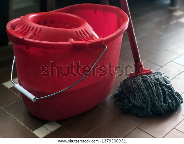 red-bucket-water-detergent-mop-600w-1379500931.jpg