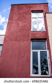 Red building with large windows