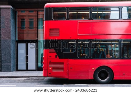 A red bus on the streets in London