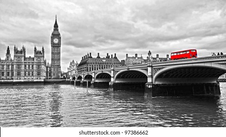 Red Bus On Westminster Bridge By The Houses Of Parliament