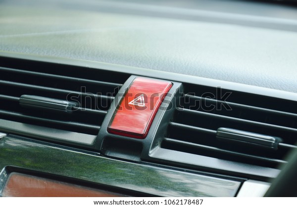 red button for\
open emergency light in car