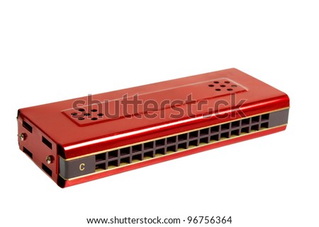 red c dur harmonica isolated on white background
