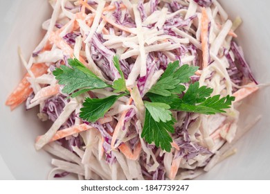 Red Cabbage And Carrot Fresh Salad In A White Plate, Vegan Healthy Dish, Top View